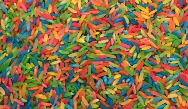 A close up of rainbow colored rice mixed together!