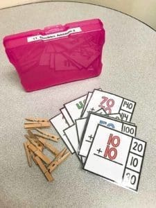 Task Boxes in the classroom -Doubles Addition in pink box with clothes pins