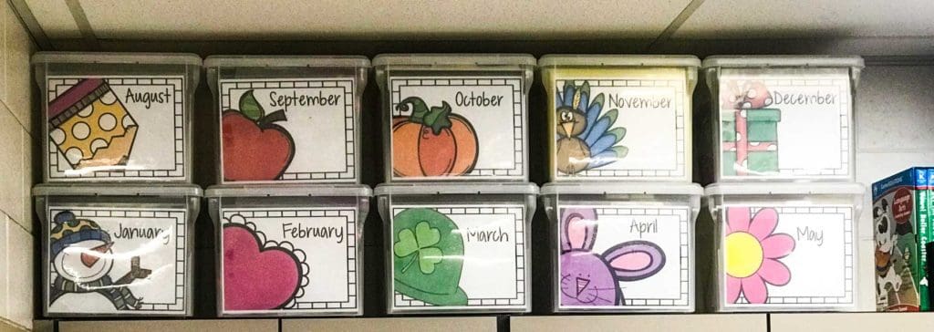 Kindergarten and 1st grade ESE teacher's Made For Me Literacy Growing Bundle Task Boxes for the year stored in clear boxes on a shelf