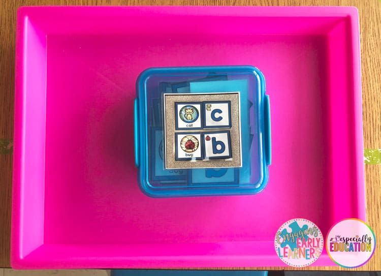 Colorful plastic boxes and drawers filled with Especially Education task box materials.