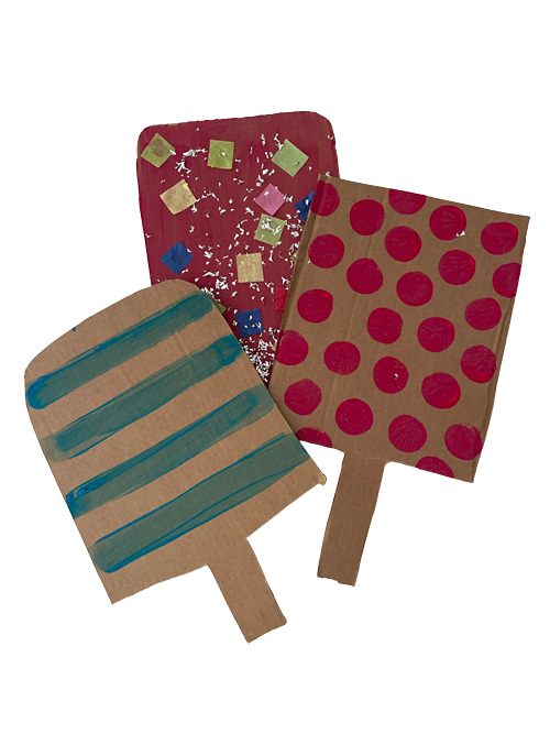 Popsicle-themed Mother’s Day crafts made from cardboard in a classroom activity for early learners