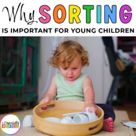 A toddler sorting her play dishes by attributes.